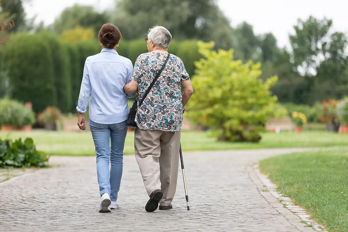 A group of senior adults eating outdoors
